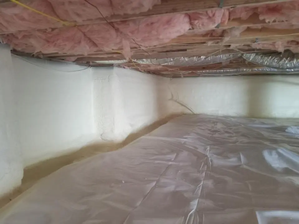 Crawl space encapsulation with closed-cell spray foam for Storm Damage Roof Repair in Coshocton